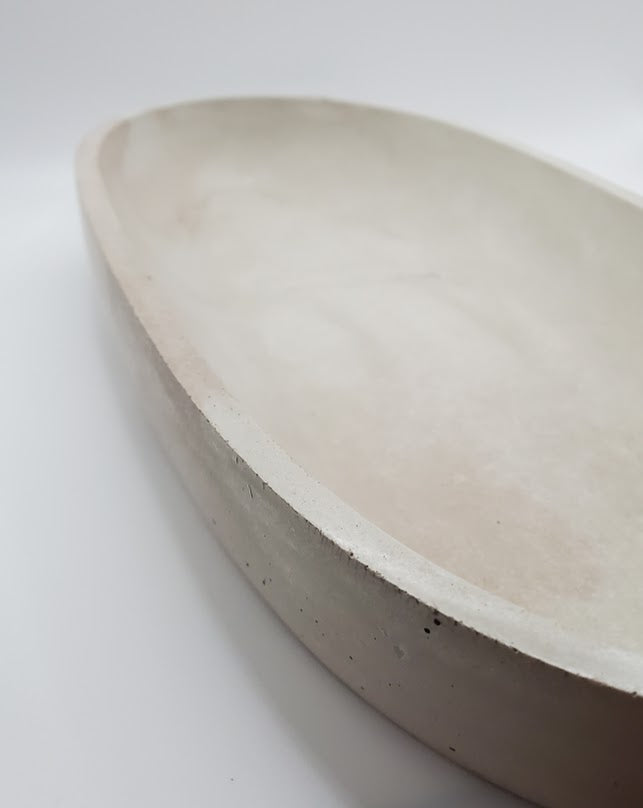 Close up oval cement dish